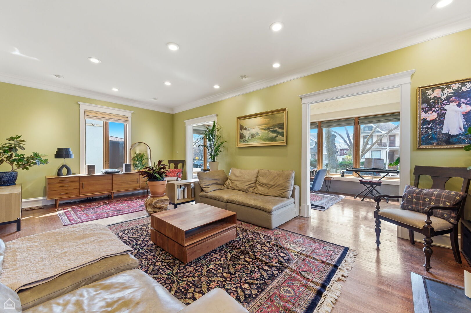 1516 West Sherwin Avenue Chicago, IL 60626 - Photo 5 of 45 a living room with furniture and a rug