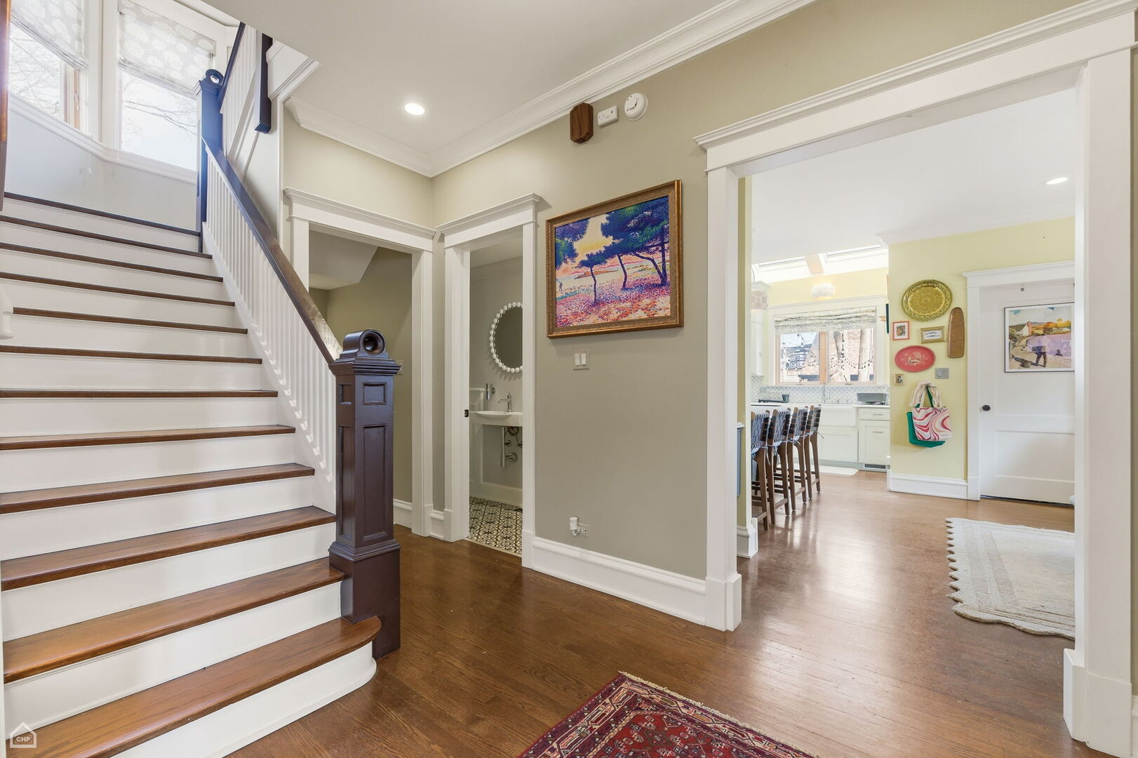 1516 West Sherwin Avenue Chicago, IL 60626 - Photo 9 of 45 a view of a hallway with wooden floor and windows