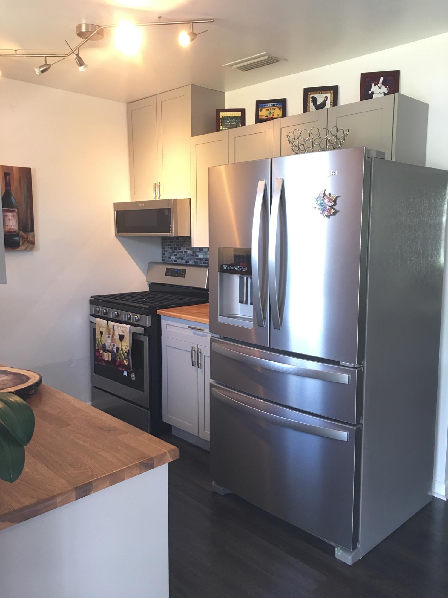 46 Andros Road Palm Springs, FL 33461 - Photo 18 of 25 Updated kitchen_Stainless steel applianc