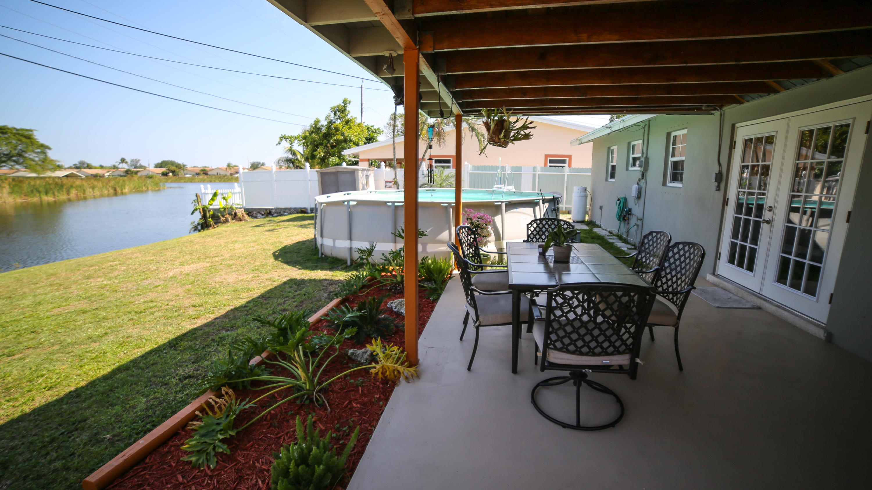 46 Andros Road Palm Springs, FL 33461 - Photo 3 of 25 Covered Patio