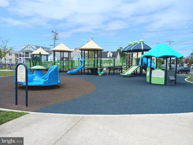 a view of a park with swings