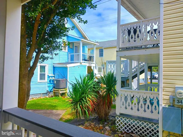 a view of a sign board with large windows