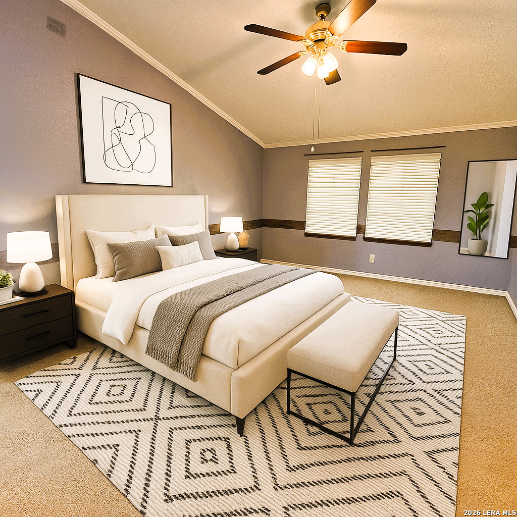 799 County Road 6612 Devine, TX 78016 - Photo 21 of 32 a bedroom with a bed and wooden floor