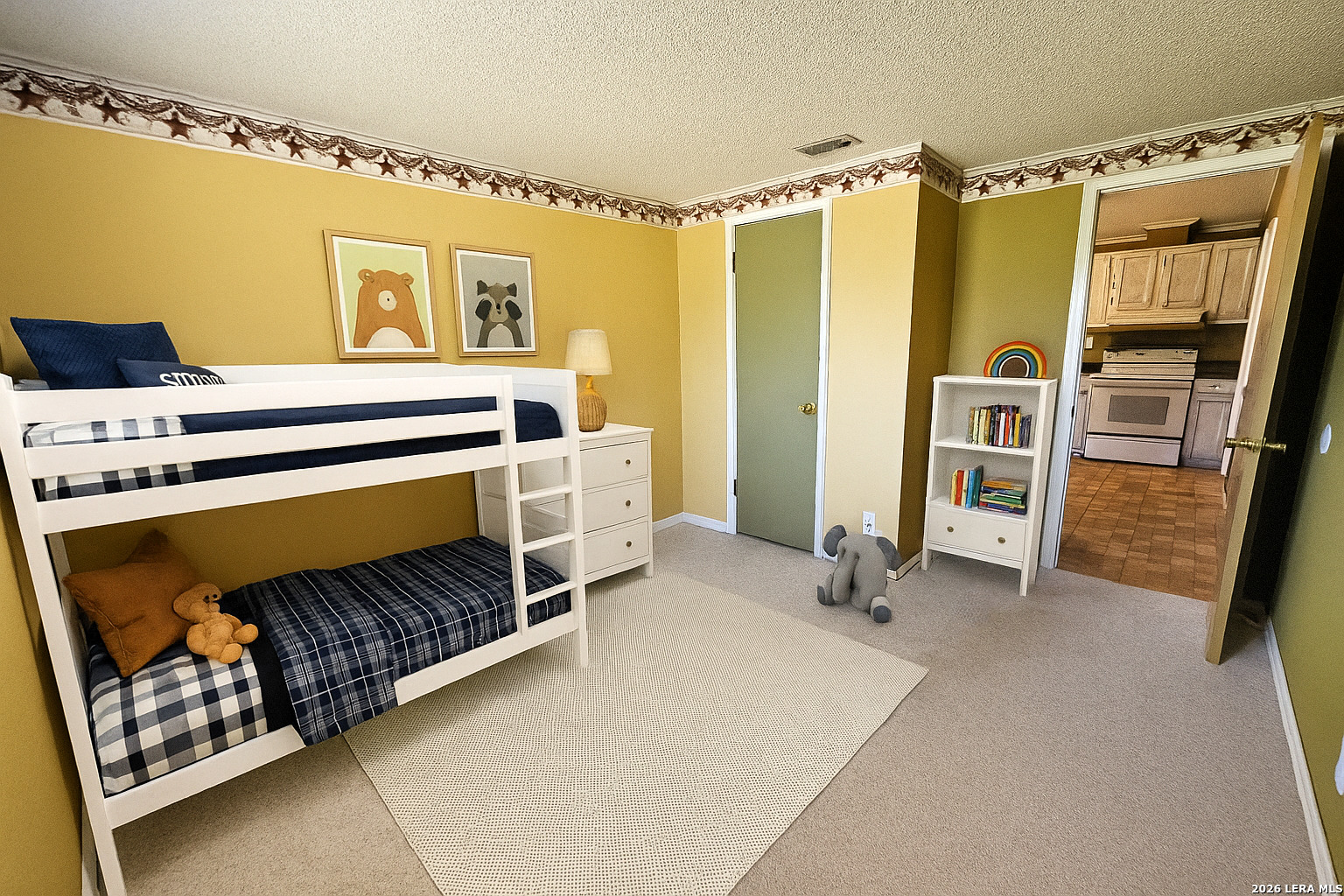 799 County Road 6612 Devine, TX 78016 - Photo 22 of 32 a bedroom with a bed and a window