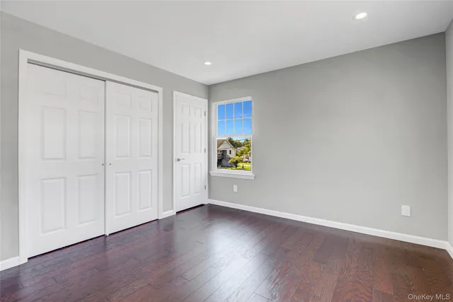 a view of a hallway with windows