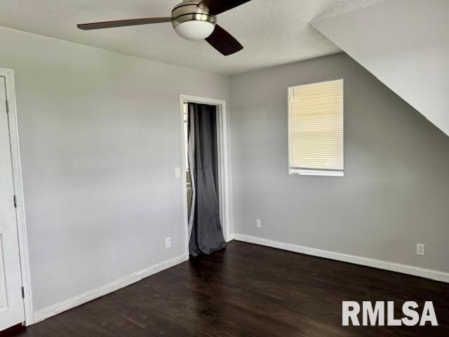 765 9th Avenue South Clinton, IA 52732 - Photo 16 of 25 an empty room with wooden floor and windows