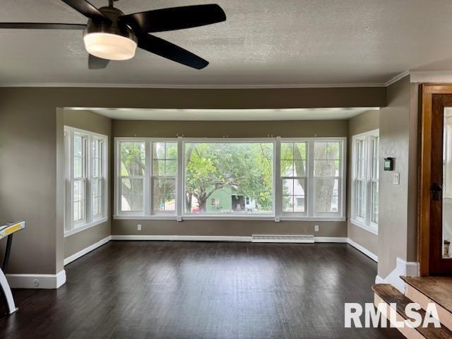 765 9th Avenue South Clinton, IA 52732 - Photo 7 of 25 wooden floor in an empty room with a large window