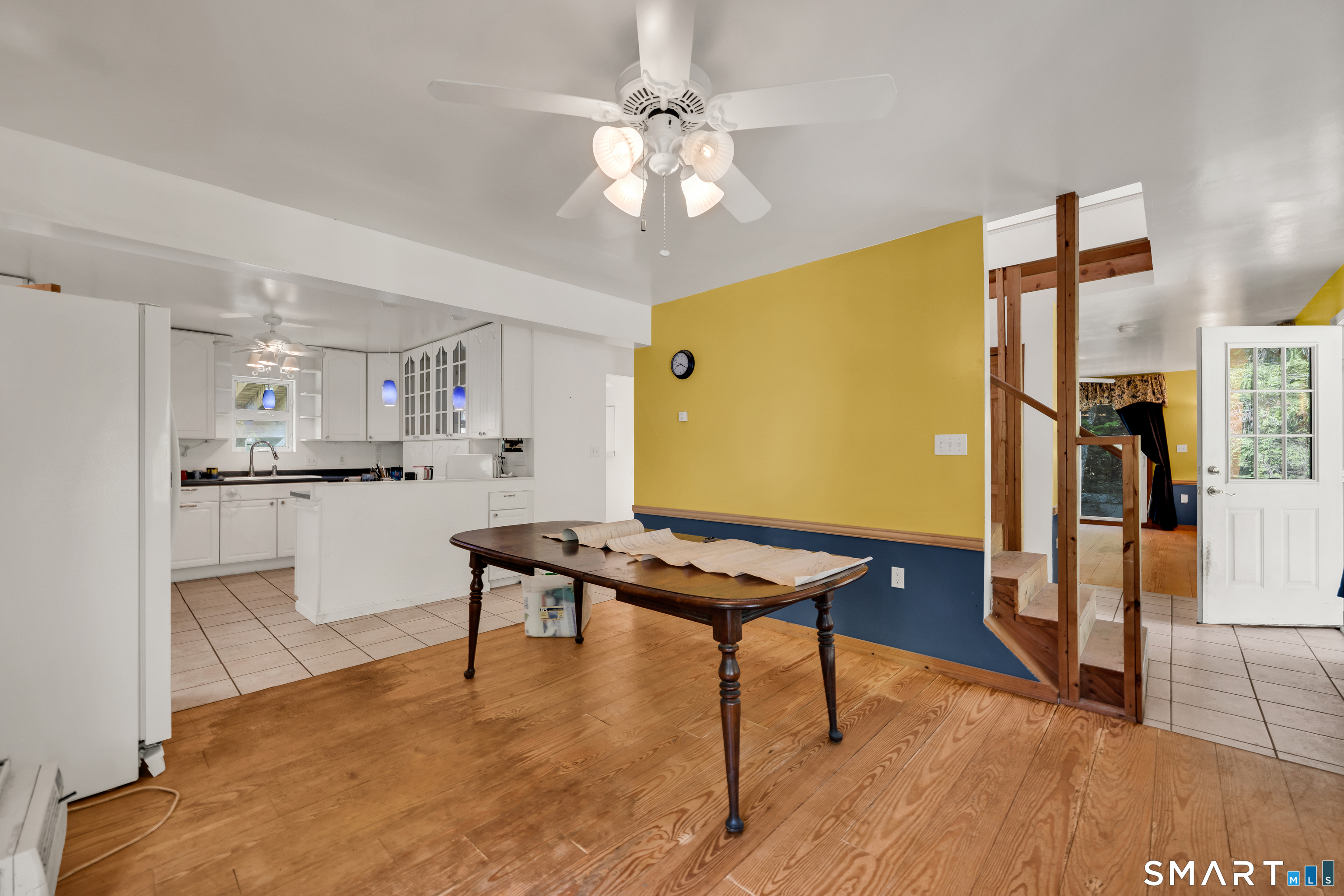 315 West Hill Road Torrington, CT 06790 - Photo 11 of 40 a living room with stainless steel appliances kitchen island granite countertop furniture and a kitchen view