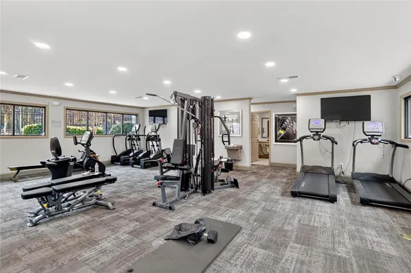 a view of a room with gym equipment