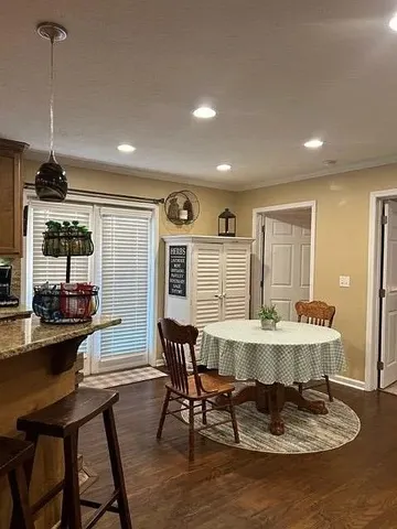 a view of a dining room with furniture