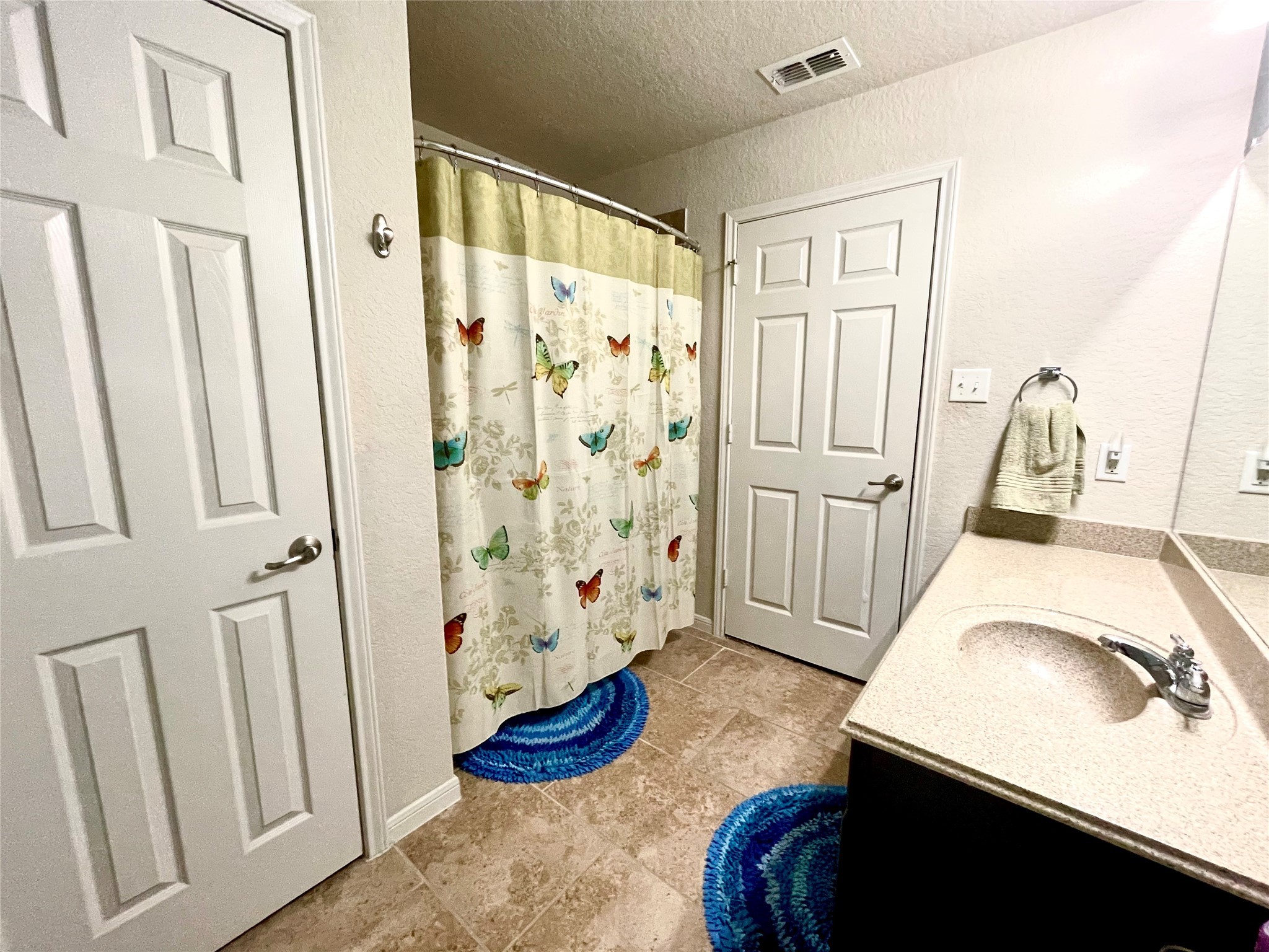 153 Citori Path New Braunfels, TX 78130 - Photo 8 of 12 a bathroom with a sink toilet and shower