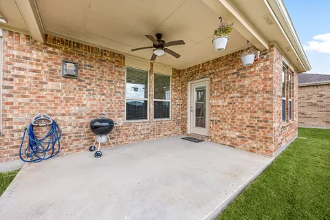 a view of a porch with a yard