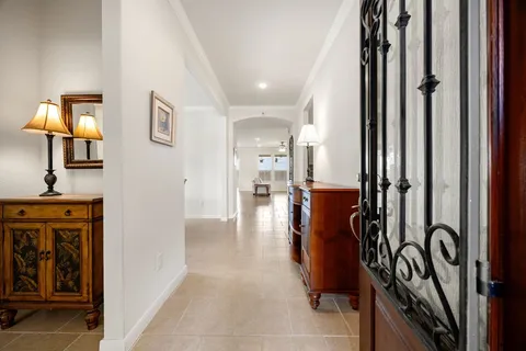 a view of a dining room with furniture and a table