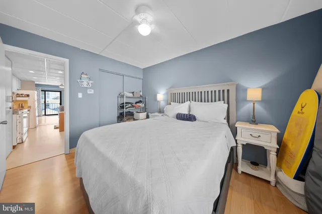 a view of a balcony with table and chairs