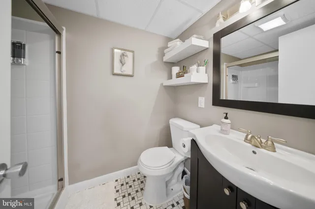 a bed room with a bed and a tv