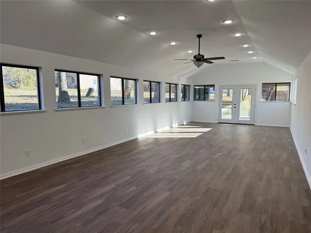 a view of cabinets with wooden floor
