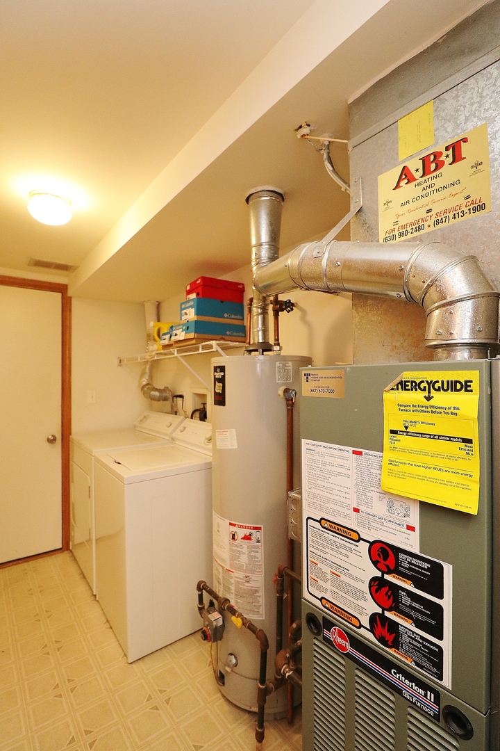 1982 Gary Court, Unit A Schaumburg, IL 60193 - Photo 11 of 21 a utility room with dryer and washer