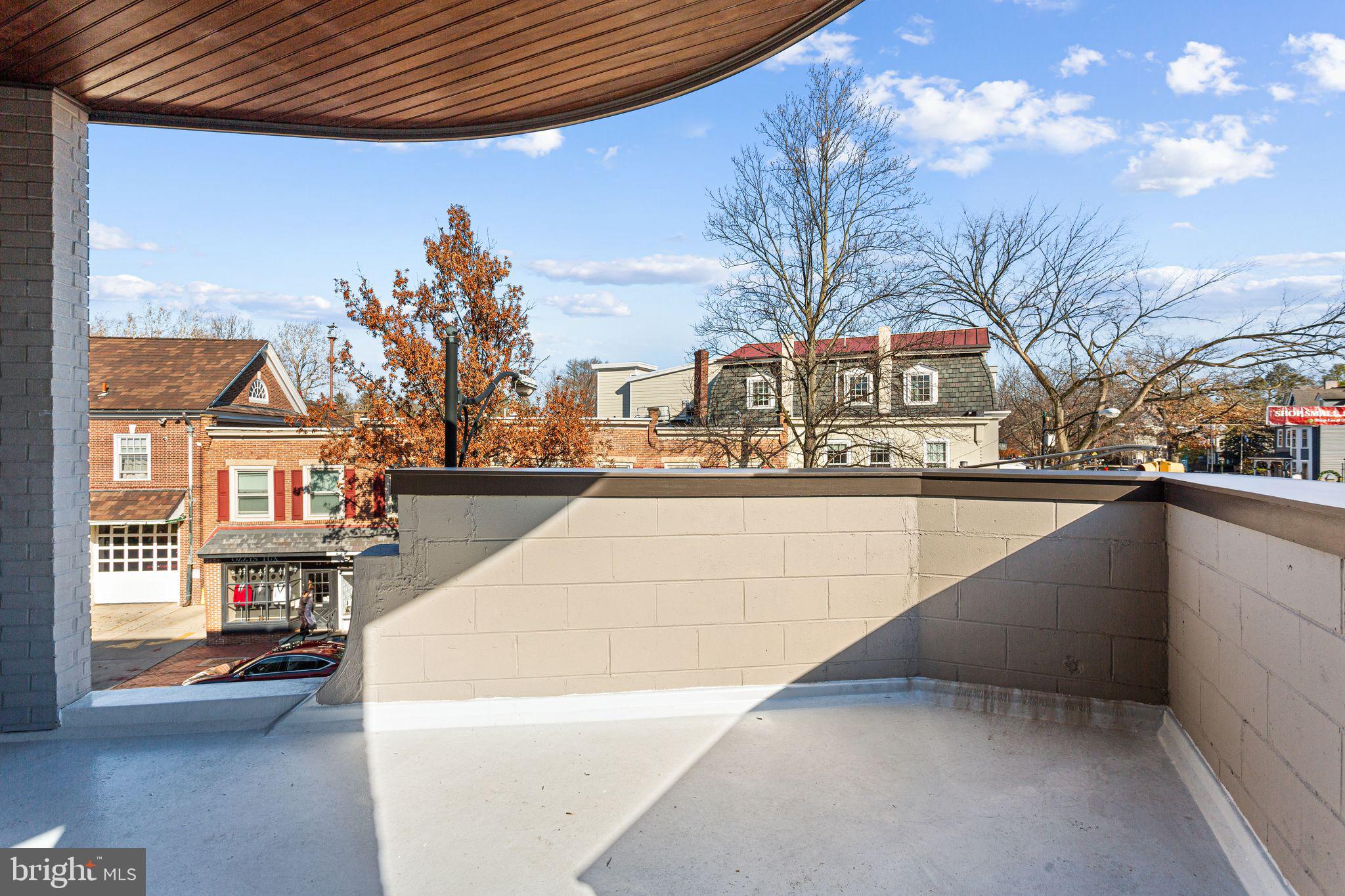 151 Kings Highway East, Unit B Haddonfield, NJ 08033 - Photo 15 of 23 a swimming pool with buildings in the background