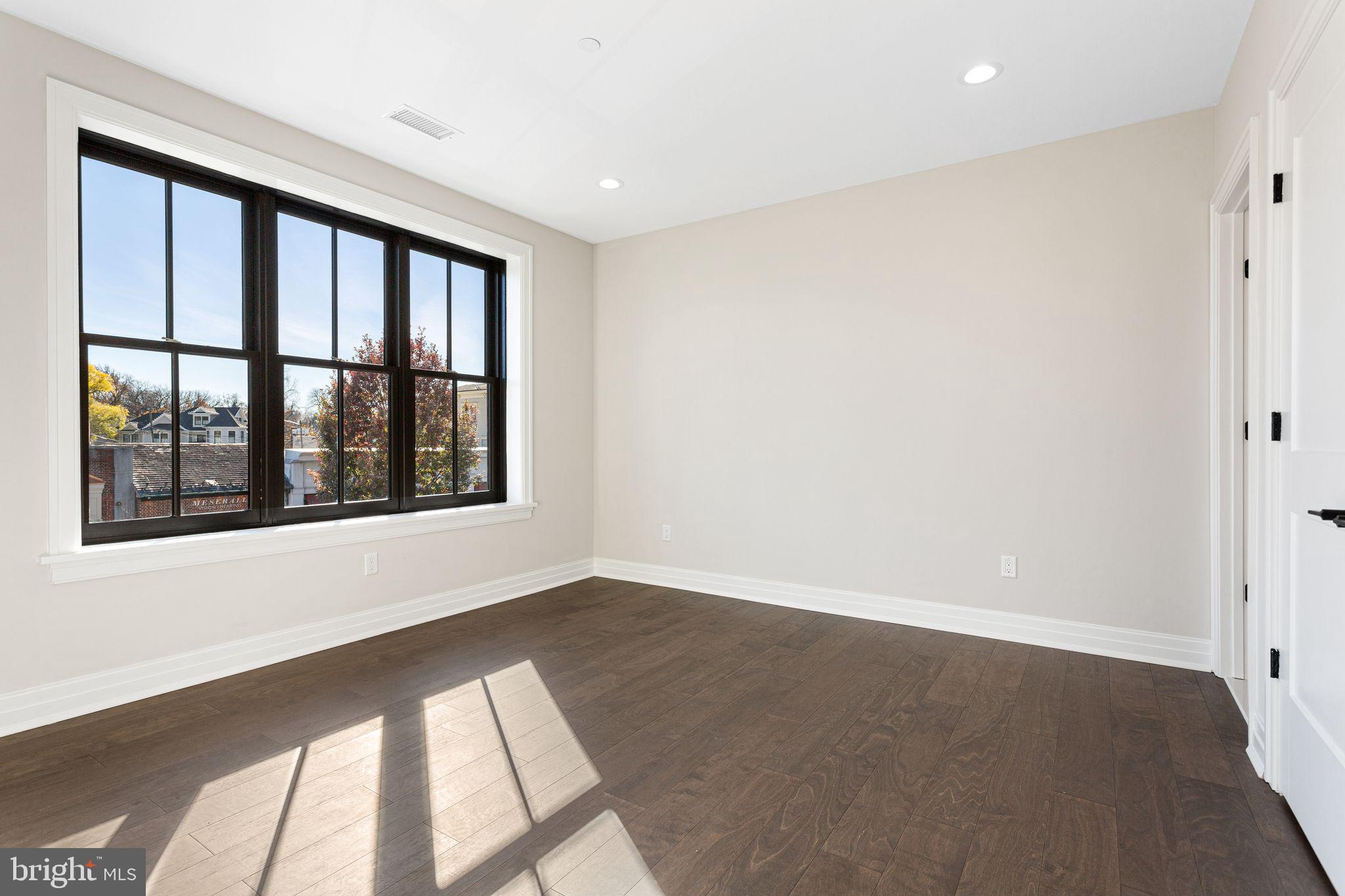 151 Kings Highway East, Unit B Haddonfield, NJ 08033 - Photo 16 of 23 a view of an empty room with a window