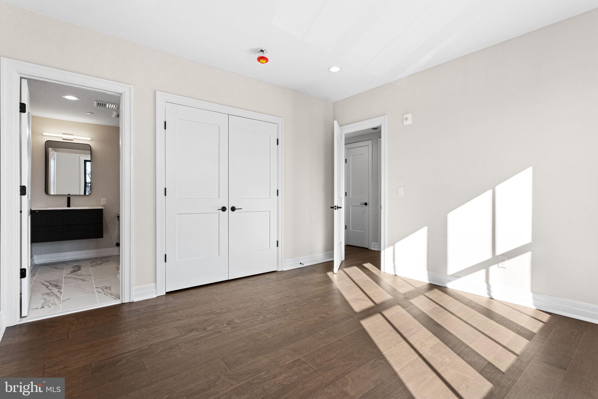 151 Kings Highway East, Unit B Haddonfield, NJ 08033 - Photo 17 of 23 a view of a room with wooden floor and windows