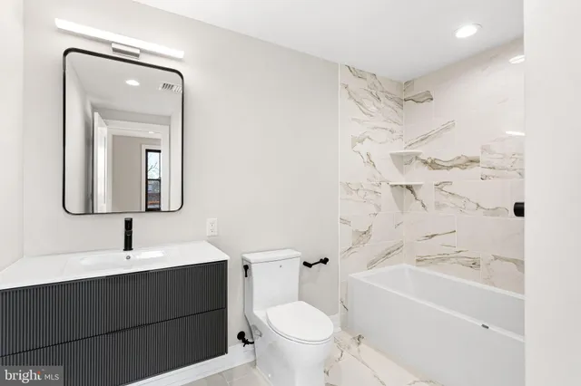 a bathroom with a bathtub