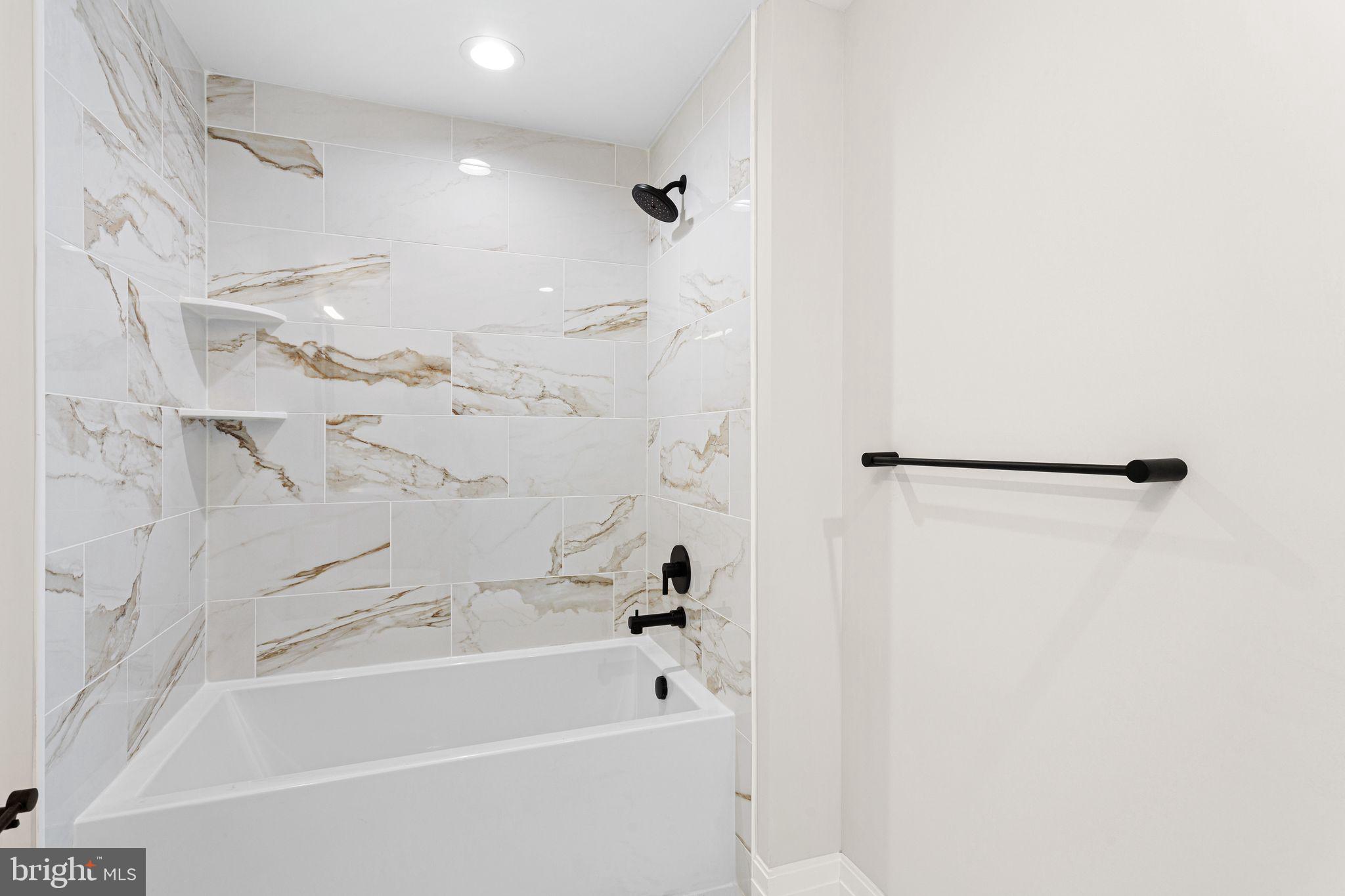 151 Kings Highway East, Unit B Haddonfield, NJ 08033 - Photo 19 of 23 a bathroom with a bathtub