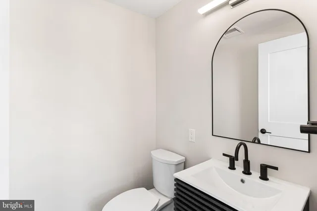 a view of a hallway with washer and dryer