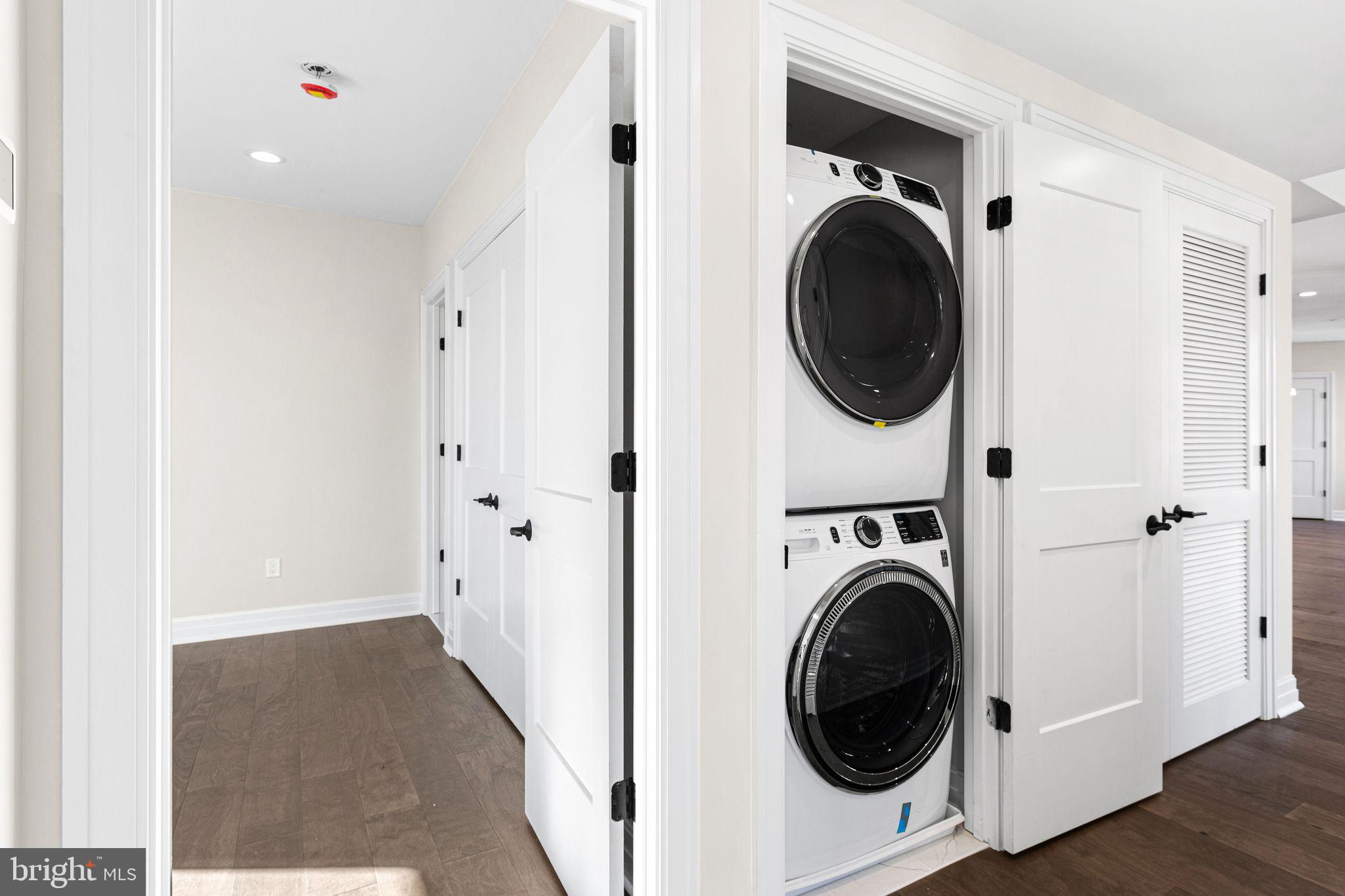 151 Kings Highway East, Unit B Haddonfield, NJ 08033 - Photo 21 of 23 a view of a hallway with washer and dryer
