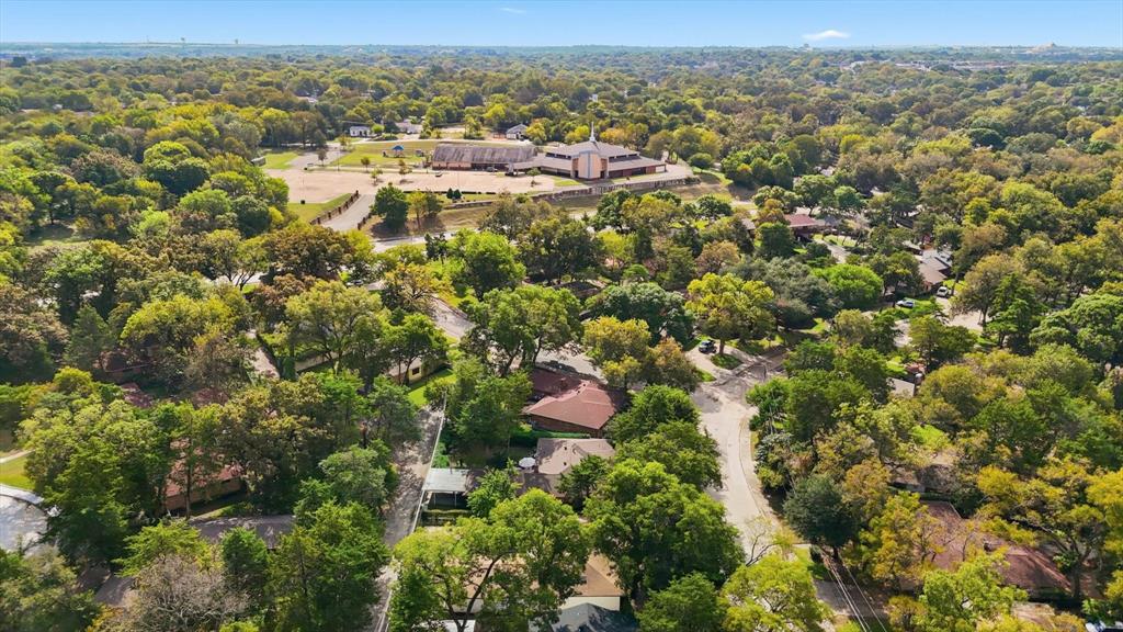 5940 Hunters View Lane Dallas, TX 75232 - Photo 21 of 24 Aerial view of property's location featuring a forest