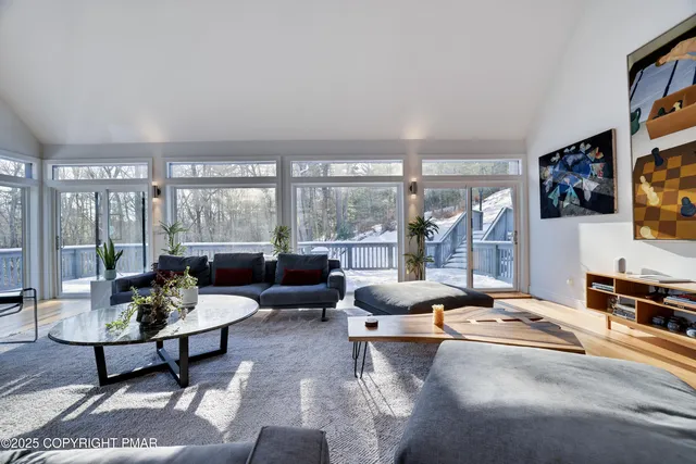 a kitchen with stainless steel appliances granite countertop a stove refrigerator and microwave