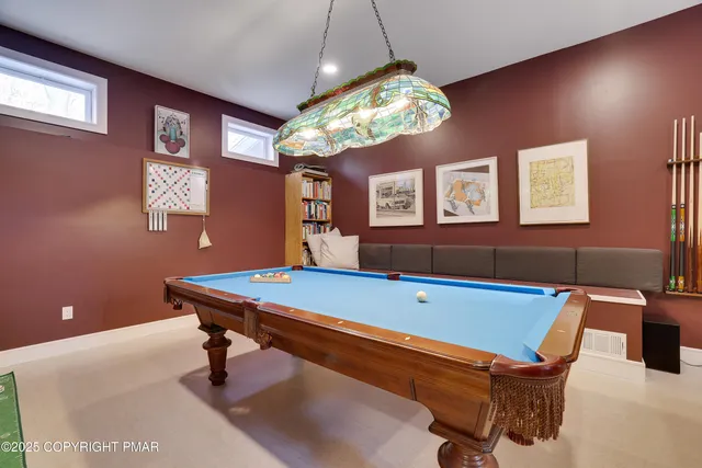 a view of a room with wooden floor and stairs