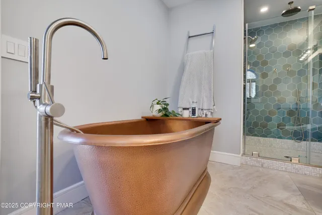 a kitchen with stainless steel appliances granite countertop a stove and a refrigerator