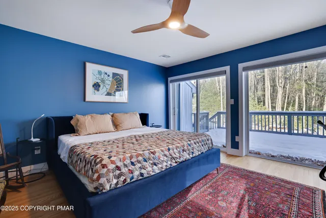 a view of balcony with wooden floor and outdoor seating
