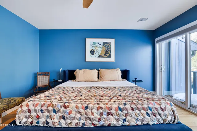 a view of a house with wooden deck