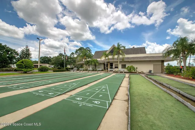 a view of a house with a big yard