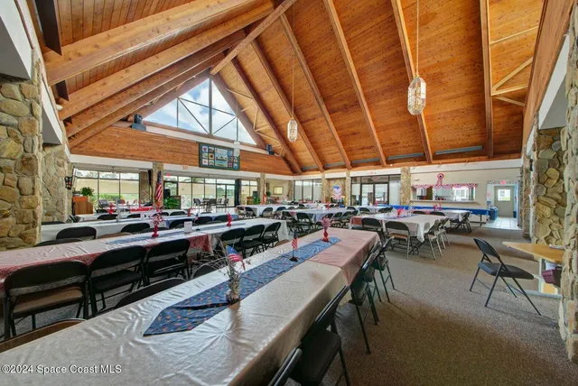 a view of a chairs and table in a patio
