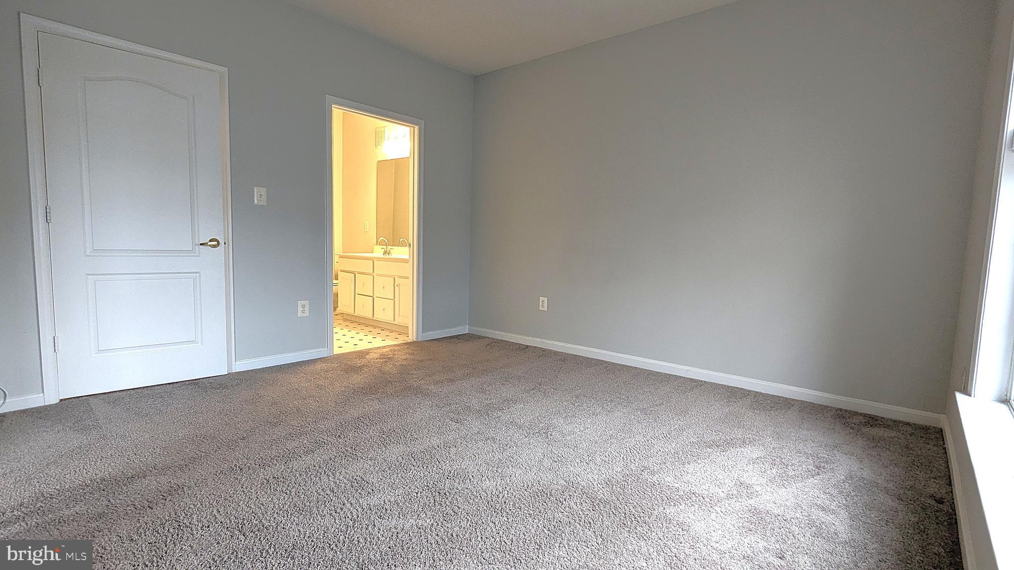 12195 Abington Hall Place, Unit 201 Reston, VA 20190 - Photo 23 of 38 Primary Bedroom