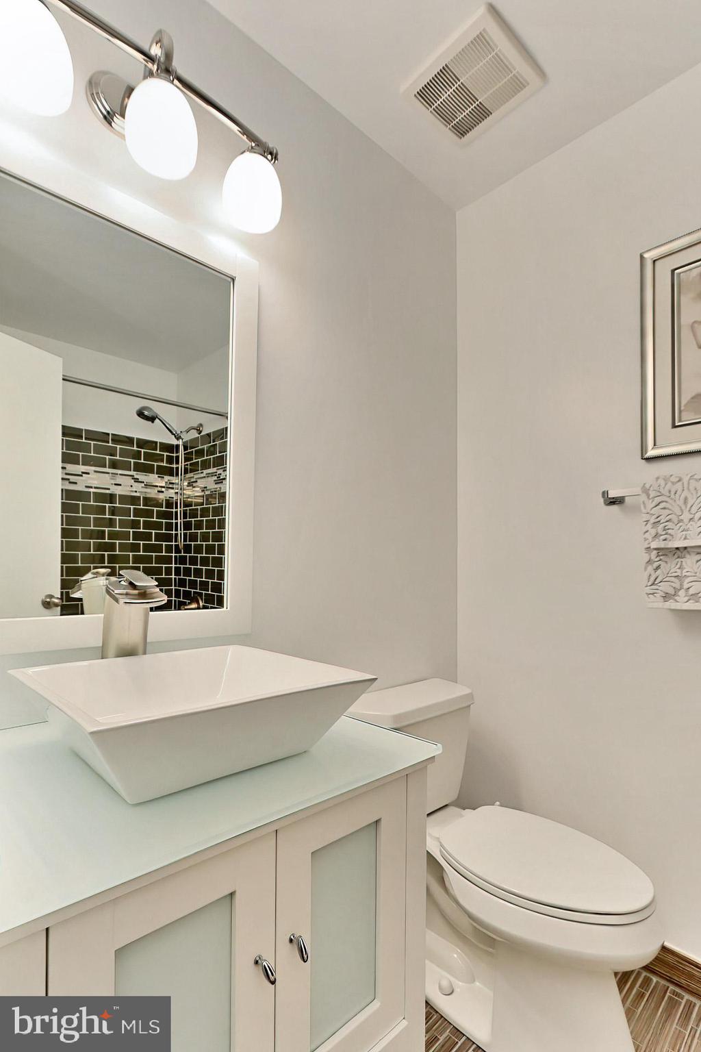 8134 Sleepy View Lane Springfield, VA 22153 - Photo 19 of 28 Renovated hall bathroom