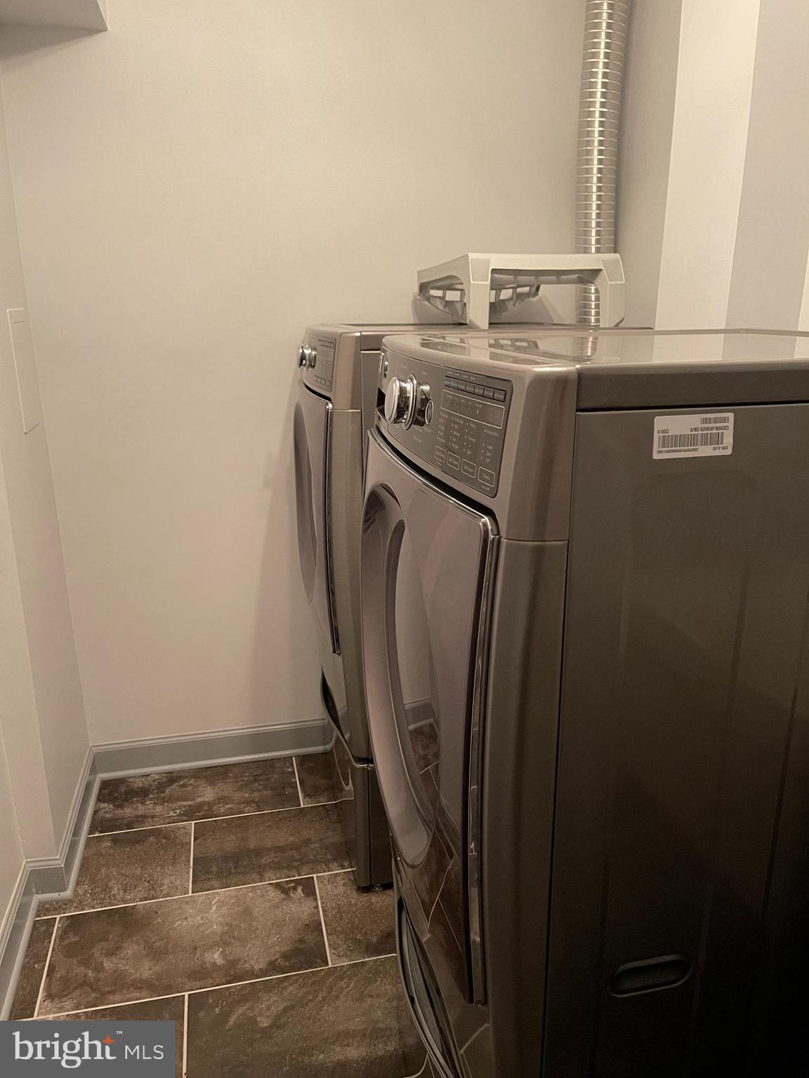 8134 Sleepy View Lane Springfield, VA 22153 - Photo 25 of 28 Laundry room with utility sink
