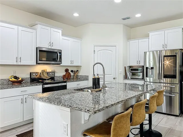 $570,000 | 16584 Point Rock Drive, Winter Garden, FL 34787