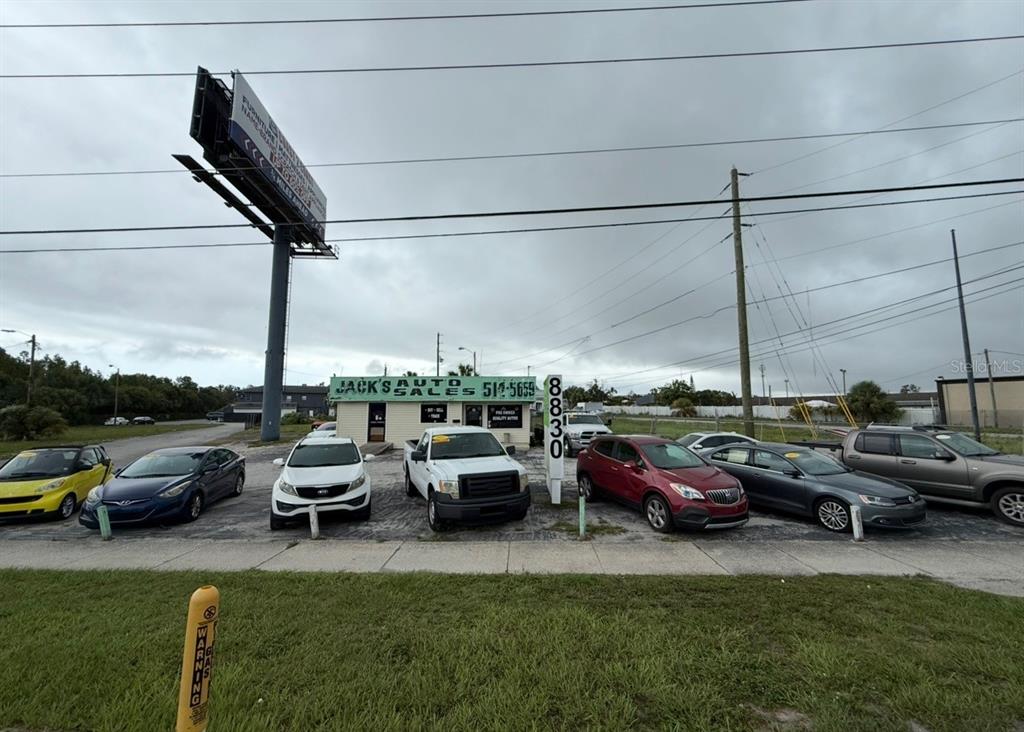 a couple of cars parked in a yard