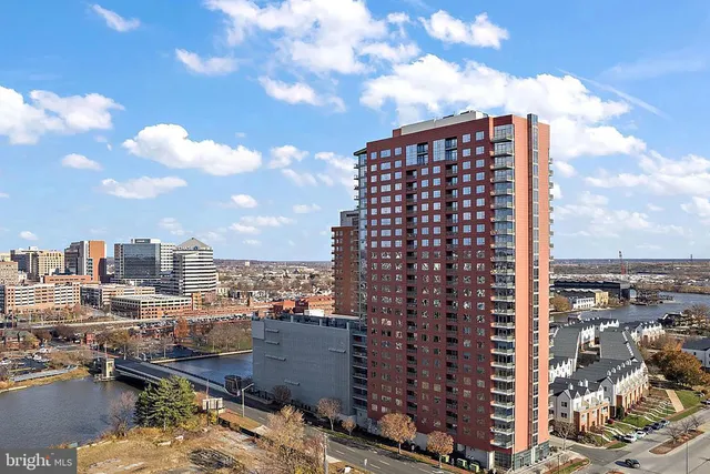 a view of a city with tall buildings