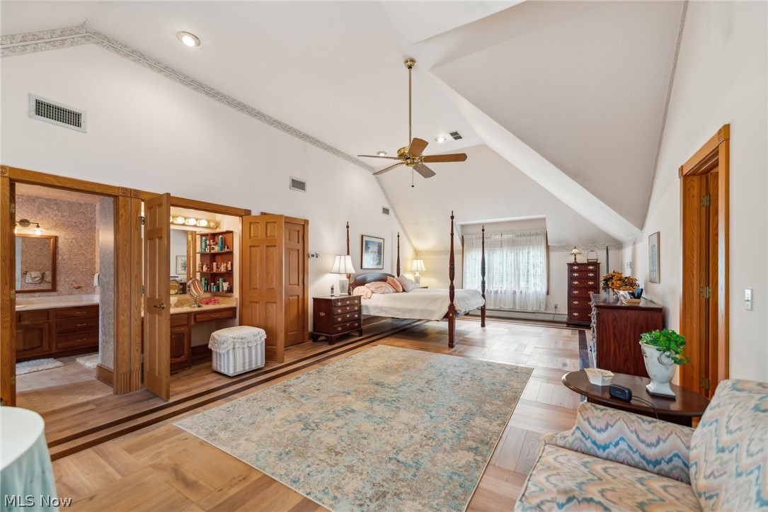 330 Overbrook Road Elyria, OH 44035 - Photo 28 of 50 Bedroom with ensuite bath, ceiling fan, and high vaulted ceiling