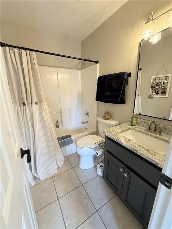 716 Manor Way, Unit 716 Cartersville, GA 30120 - Photo 21 of 21 a spacious bathroom with a granite countertop sink toilet and shower