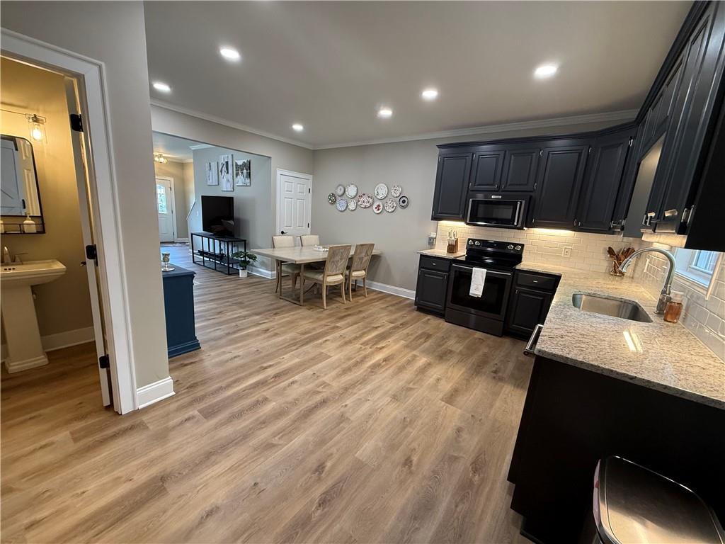 716 Manor Way, Unit 716 Cartersville, GA 30120 - Photo 8 of 21 a living room with furniture