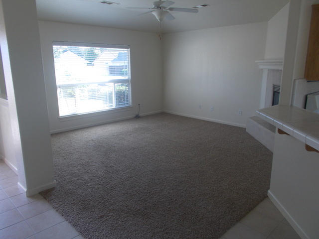 2649 Rhinestone Way Redding, CA 96001 - Photo 6 of 25 an empty room with a window