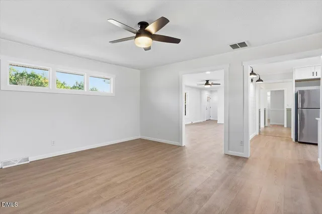 a view of a livingroom with wooden floor