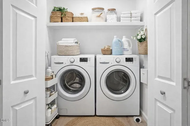 a utility room with dryer and washer