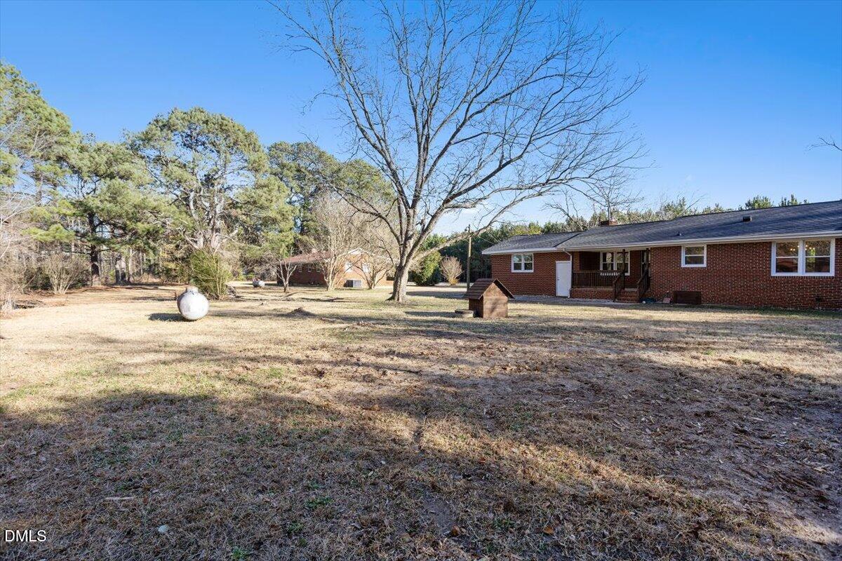 2609 Old Rte 22 Kenly, NC 27542 - Photo 37 of 43 a view of a house with a yard
