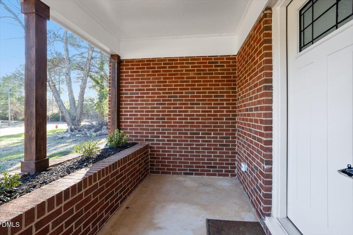 2609 Old Rte 22 Kenly, NC 27542 - Photo 42 of 43 a view of balcony with wooden floor